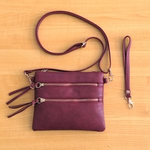 Compact maroon purse and wristlet